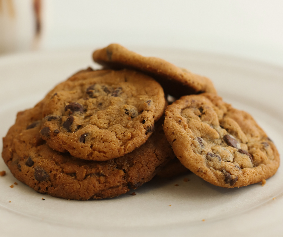 A plate full of chocolate chip cookies